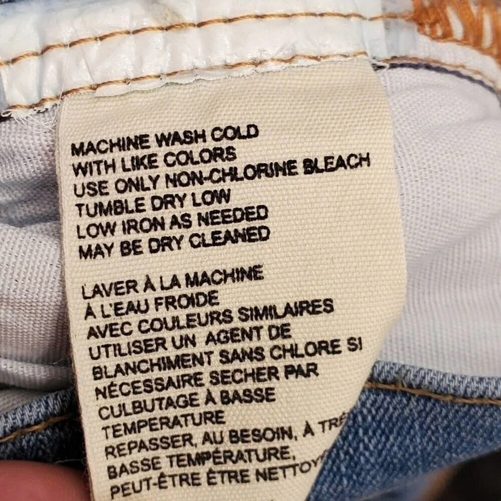Free People light wash distressed diagonal raw‎ hem jeans size 30 new!!!
